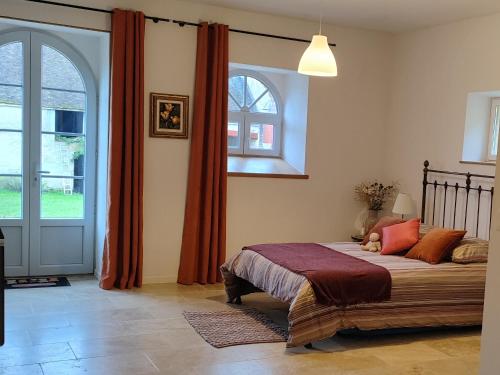 Postel nebo postele na pokoji v ubytování Gîte entre Loire, Vignobles et Bertranges