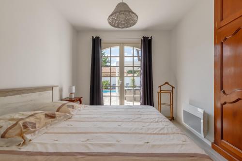 Ένα ή περισσότερα κρεβάτια σε δωμάτιο στο Villa Brétignolles