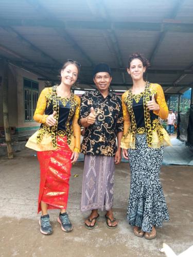 a group of three people posing for a picture at Tetebatu Fullmoon in Tetebatu