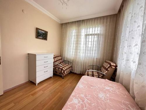 Ένα ή περισσότερα κρεβάτια σε δωμάτιο στο Mişona Evi “Huzur ve Manzara bir arada”