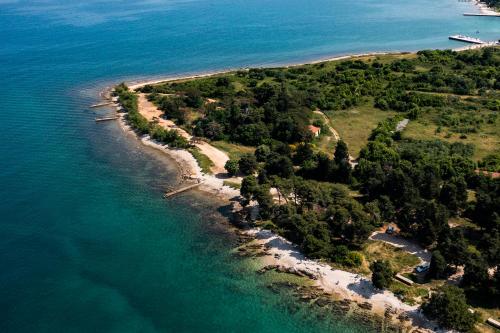 an aerial view of an island in the ocean at Sunset Apartment in Zadar