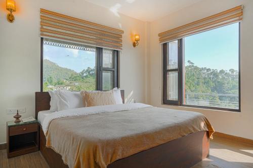a bedroom with a large bed with a large window at SaffronStays Summer Estate in Kasauli