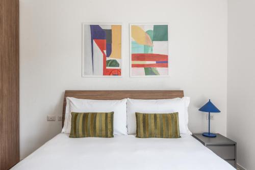 Una cama o camas en una habitación de Numa Rome Verso