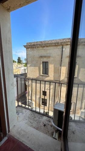 a view of a building from a balcony at La Dimora Del Barone in Vernole