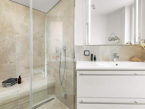 a bathroom with a shower and a sink at Apartment Wendtorf XXXI in Wendtorf