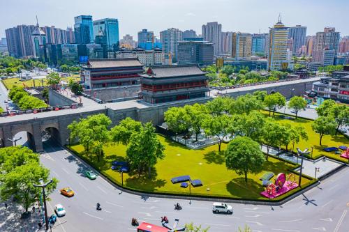 an aerial view of a city with a park at Joke Inn in Xi'an