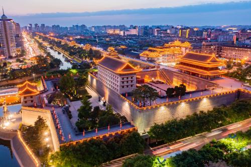 an aerial view of a city at night at Joke Inn in Xi'an