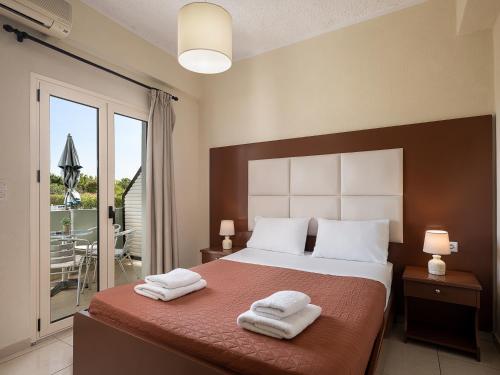 Postel nebo postele na pokoji v ubytování Sofia Apartments
