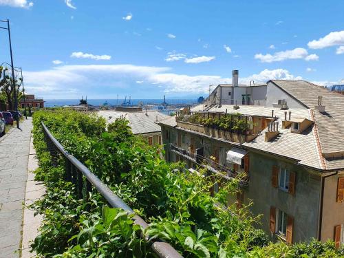 a view of a city with buildings and vegetation at [La casa dell'Arte] con parcheggio gratuito in Genoa