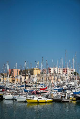 a bunch of boats docked in a harbor at B&B Palazzo Vittoria in Bisceglie
