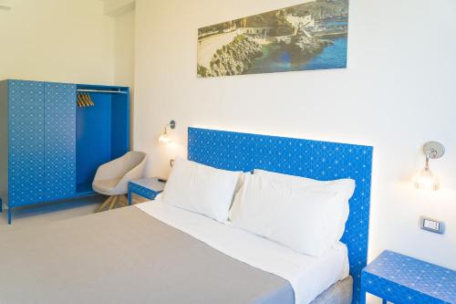 Ένα ή περισσότερα κρεβάτια σε δωμάτιο στο Hotel Orsa Maggiore