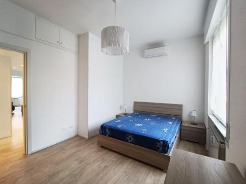 מיטה או מיטות בחדר ב-Incantevole Appartamento Genova Quinto vicino alla spiaggia