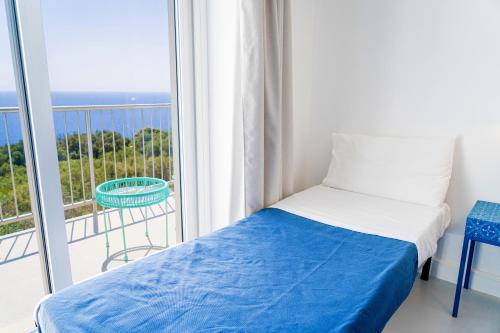 Ένα ή περισσότερα κρεβάτια σε δωμάτιο στο Hotel Orsa Maggiore