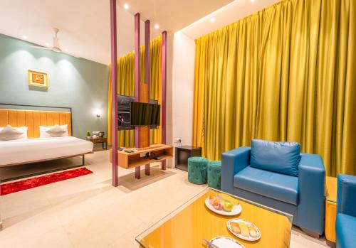 Una cama o camas en una habitación de Shamrock Greens by Jardin Hotels