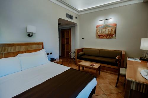 Letto o letti in una camera di Hotel Forum