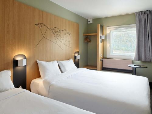Postel nebo postele na pokoji v ubytování B&B HOTEL Paris Roissy CDG Aéroport