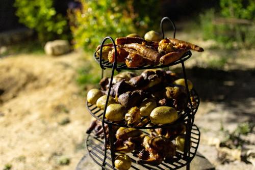 a black rack with food on top at The Rock Camp Petra in Wadi Musa
