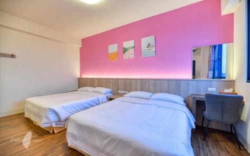 Postel nebo postele na pokoji v ubytování 漫活時光民宿 Leisure Living