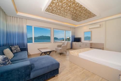 Televisyen dan/atau pusat hiburan di Moda Beach Hotel