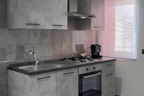 Η κουζίνα ή μικρή κουζίνα στο Garibaldi Rooms