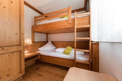 Ένα ή περισσότερα κρεβάτια σε δωμάτιο στο Vitalpina Hotel Magdalenahof
