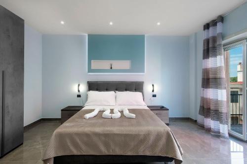 Ένα ή περισσότερα κρεβάτια σε δωμάτιο στο Garibaldi Rooms