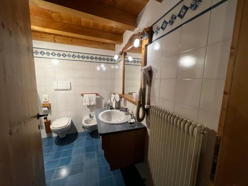 Galería fotográfica de KAISERKRONE CHARMING RETREAT en Dimaro