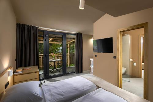 Postel nebo postele na pokoji v ubytování Holiday Homes Kačjak