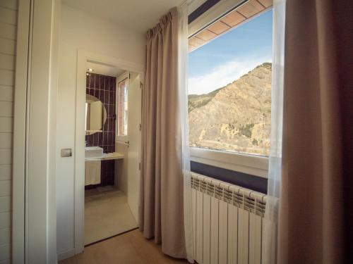  Hotel Roc Meler -  Room  picture :   Shower    Safety deposit box    TV                           