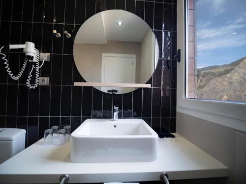  Hotel Roc Meler -  Room  picture :   Shower    Safety deposit box    TV                           