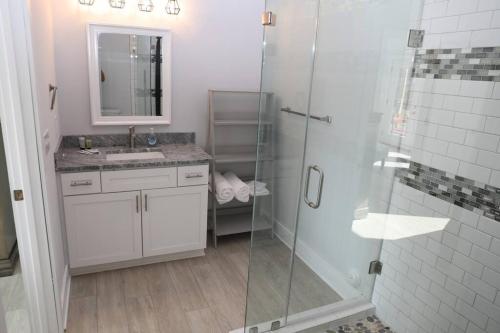 a bathroom with a shower and a sink at Golf Views Mount Airy in Mount Airy
