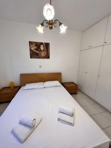 Llit o llits en una habitació de Iris Village
