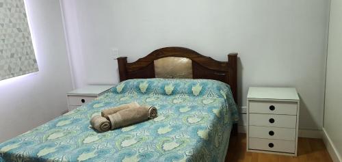 เตียงในห้องที่ Complejo Residencial Privado 2