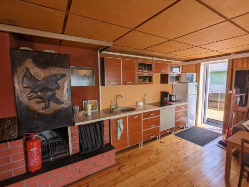 a kitchen with a sink and a counter top at Mereääre in Haapsalu