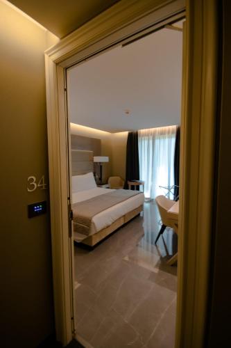 Letto o letti in una camera di Hotel Forum
