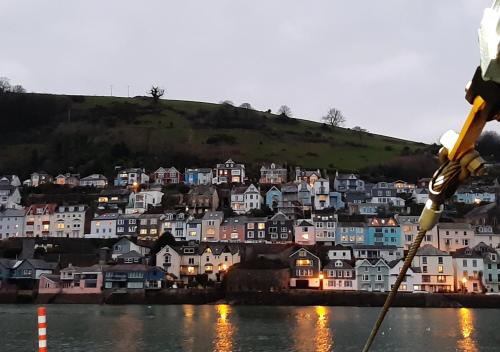 a view of a town from the water at Gulls Cry in Stoke Fleming