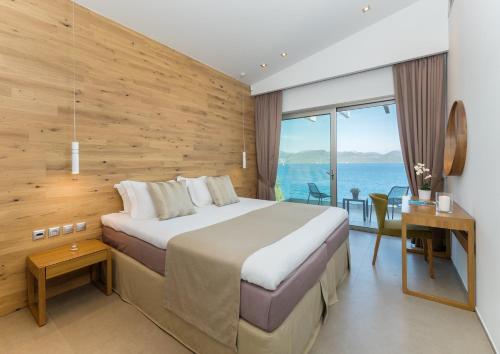 Ένα ή περισσότερα κρεβάτια σε δωμάτιο στο Villa Melia