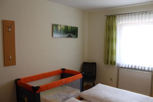 Una cama o camas en una habitación de Hoidaberger
