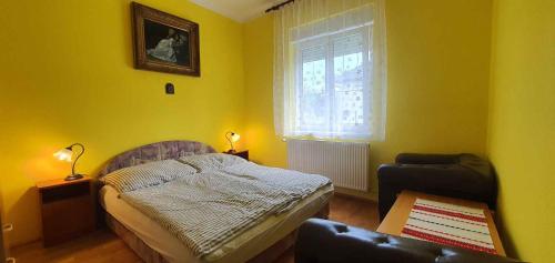 En eller flere senge i et værelse på Apartment Balatonboglar 3