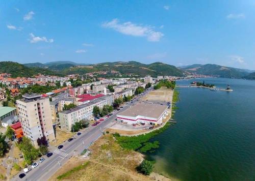 an aerial view of a town next to the water at Apartment Mia's Home in Orşova