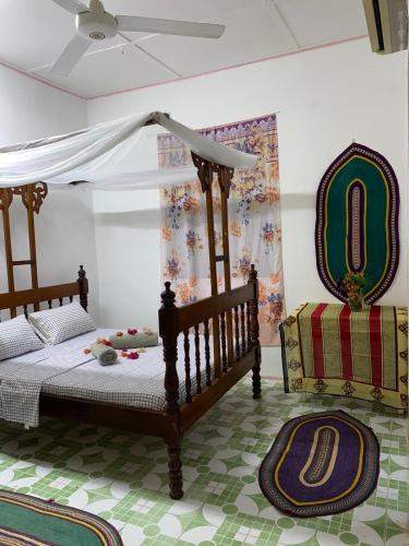 Letto o letti in una camera di Sanaa Hostel