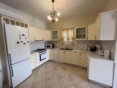A cozinha ou cozinha compacta de Panoramic View Villa