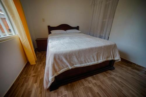Postel nebo postele na pokoji v ubytování Casa las ruelias