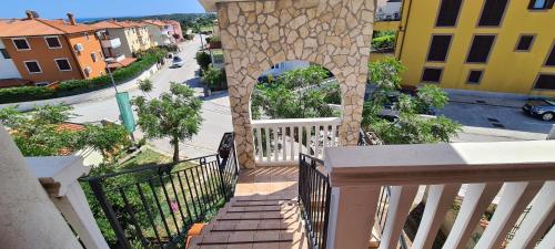 a view of a stairway from a balcony of a building at Bed & Breakfast Villa Adriana in Premantura