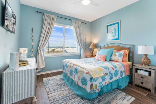 a bedroom with a bed and a window at Gratitude Island in Navarre