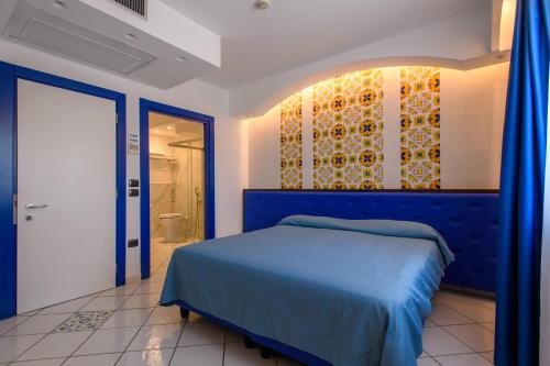 Postel nebo postele na pokoji v ubytování Hotel Ancora