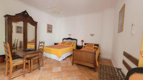 Postel nebo postele na pokoji v ubytování Hotel Du Forum