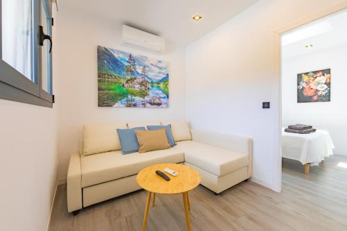 Ένα ή περισσότερα κρεβάτια σε δωμάτιο στο La Casita de Hugo