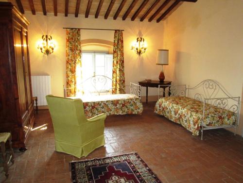 Agriturismo La Voltaにあるベッド