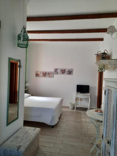 Cama o camas de una habitación en Fattoria La Traccia